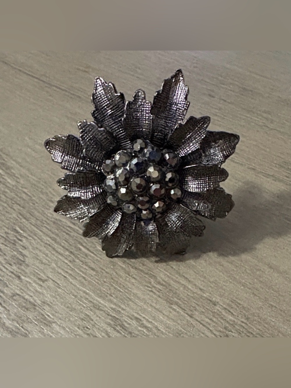 Statement Flower Ring in Gunmetal with Faceted Crystal Center